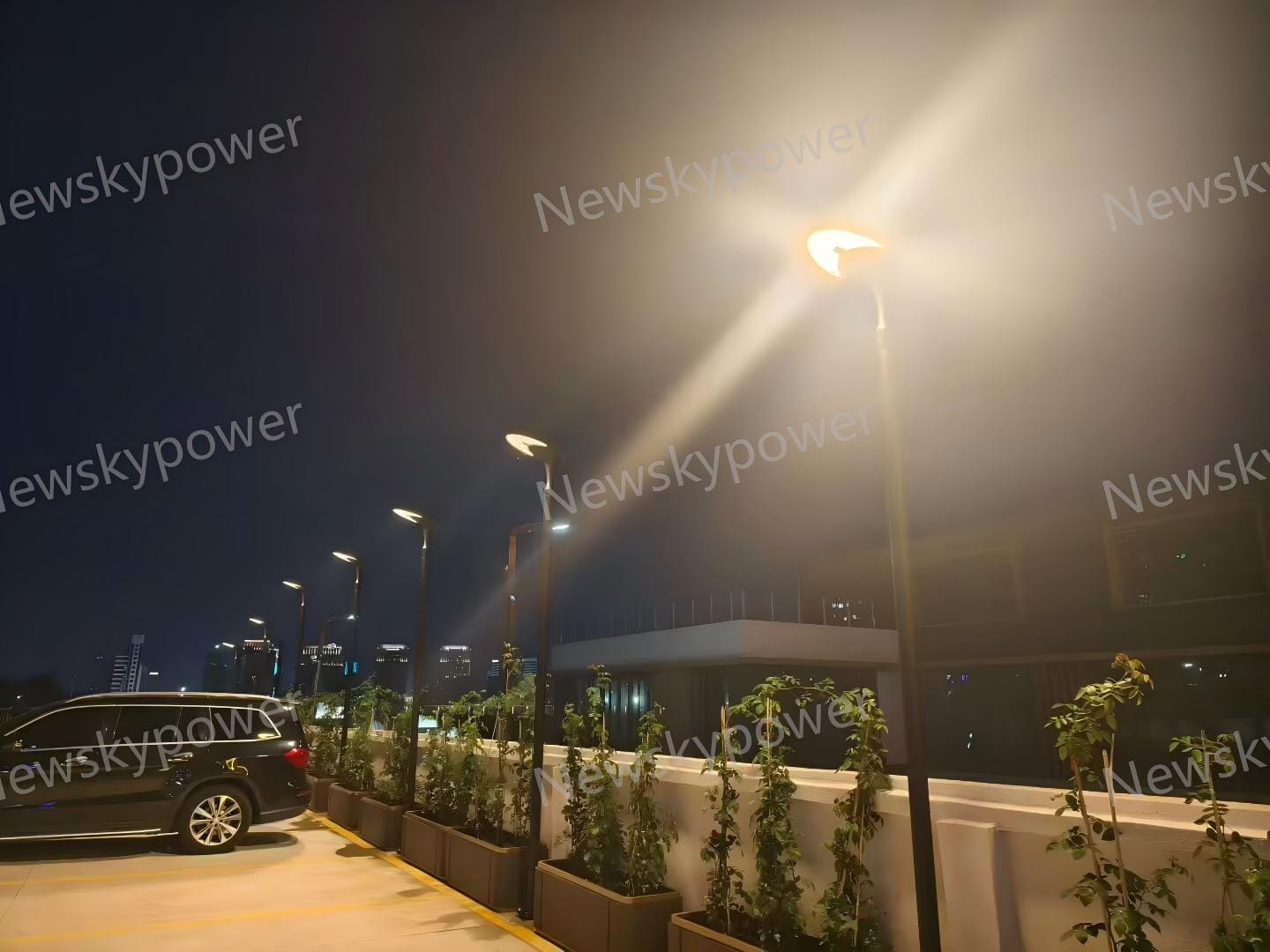 SCL-008 solar courtyard light installation around an outdoor parking area