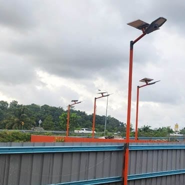 Separate-panel Newskypower solar street lights installed along a roadway