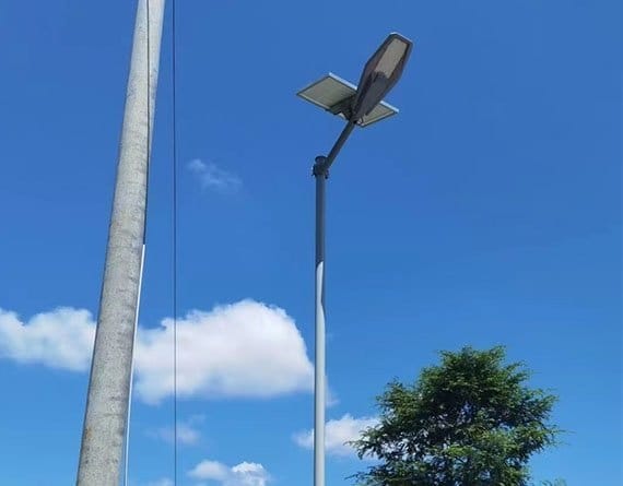 Newskypower separate-panel solar street light installed beside a road