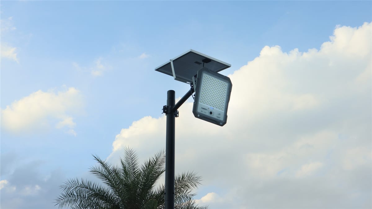Separate panel and flood light mounted at different angles