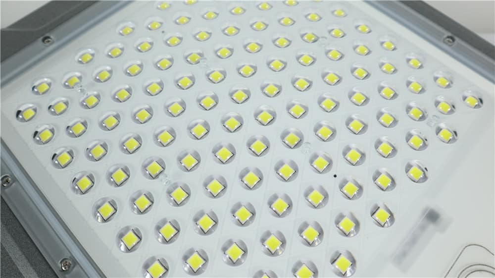 Close view of the individual optics on a solar flood light