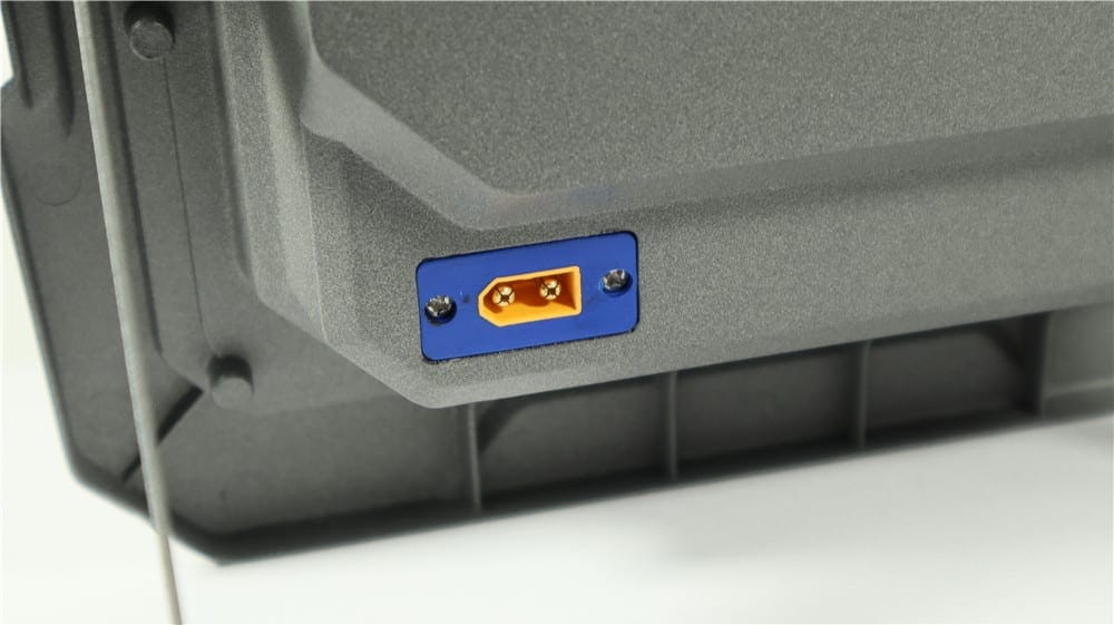 External connector socket on the rear of a flood light