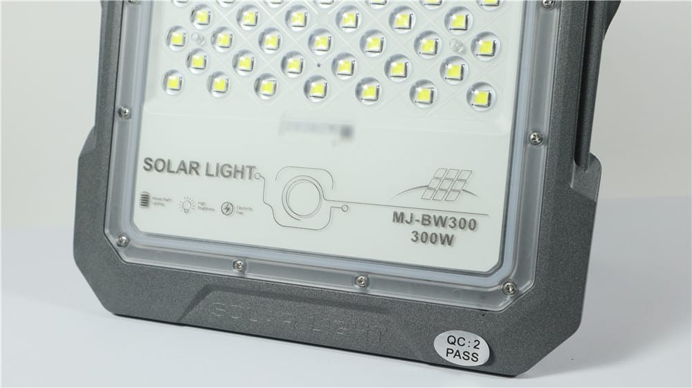 Close view of the model marking and front controls on a BW flood light