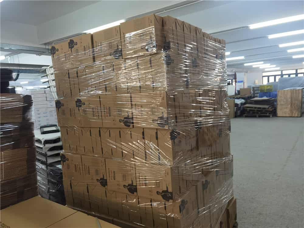 Stacked cartons inside a product workshop