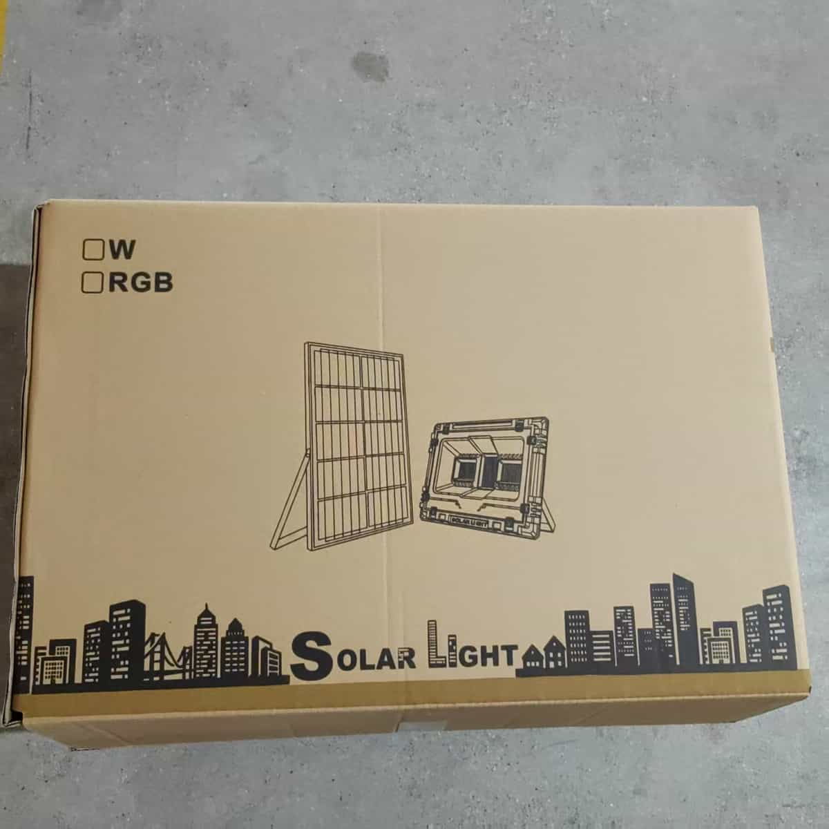 Solar flood light carton with lamp and panel drawings
