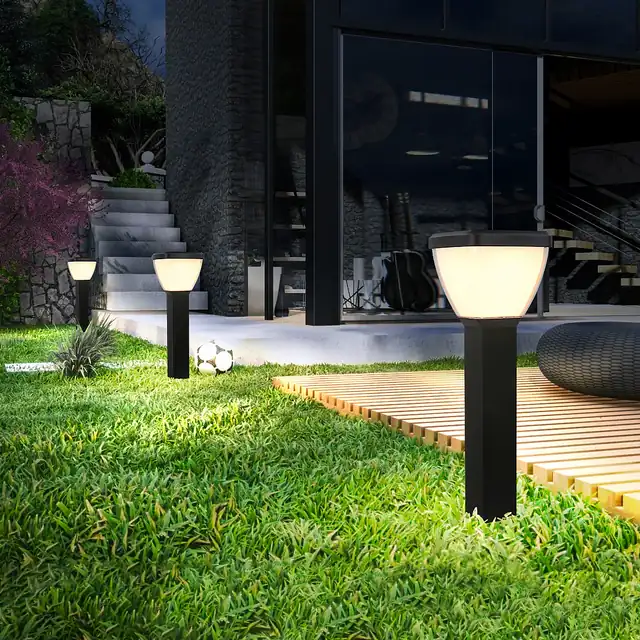 Supplier scene showing low-level SLL-010 bollards beside lawn and decking