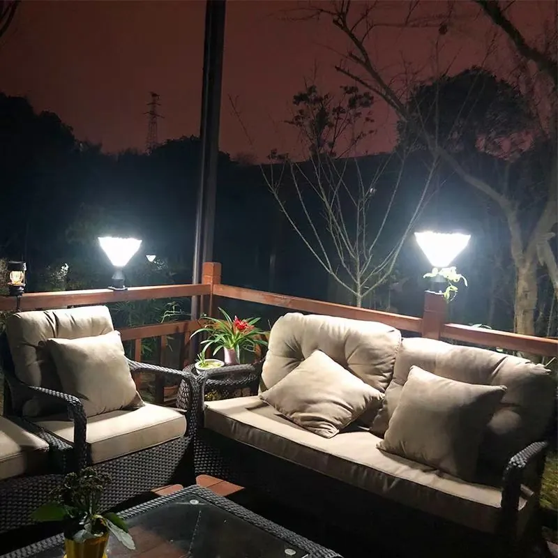 Illuminated landscape fixtures beside terrace seating
