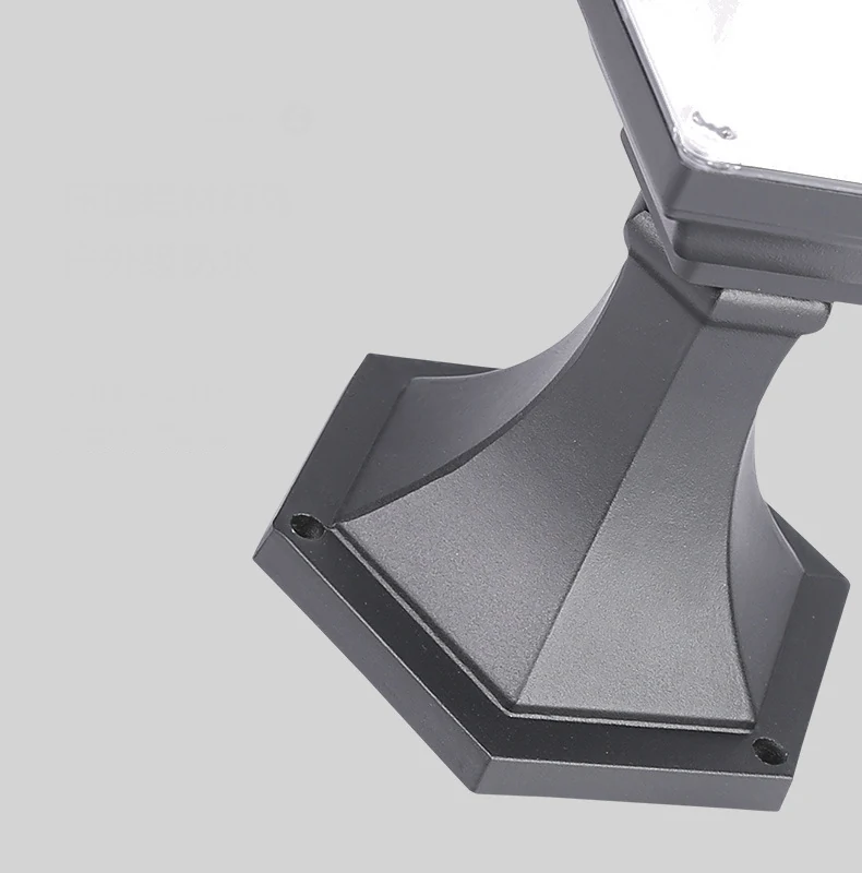Close view of a pillar-light base, fixing holes and lower housing