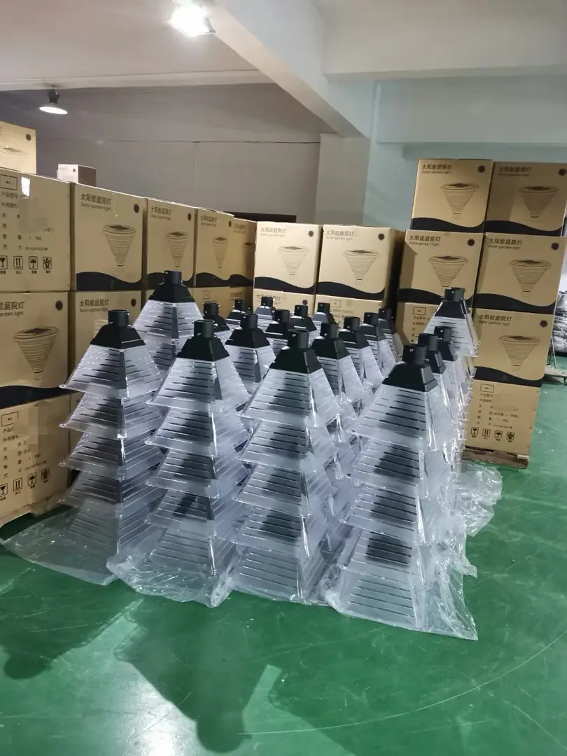 Rows of wrapped lantern-form fixtures and cartons
