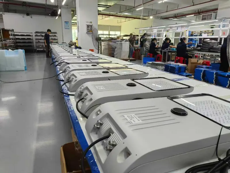 Solar street lights arranged along an assembly line