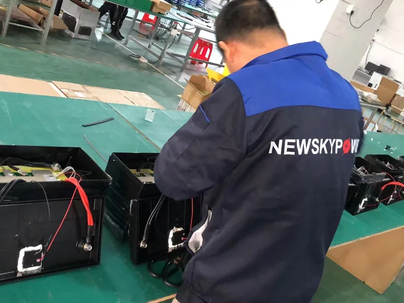 Technician working on solar light components