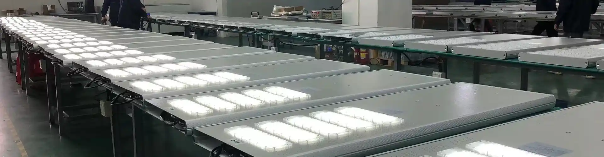 Solar street lights undergoing illuminated workshop testing