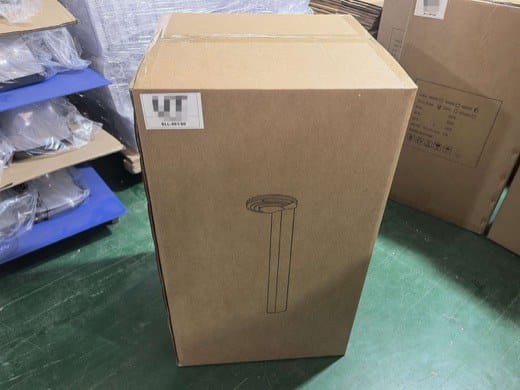 SLL-001/80 marking on a solar bollard light carton in the packing area