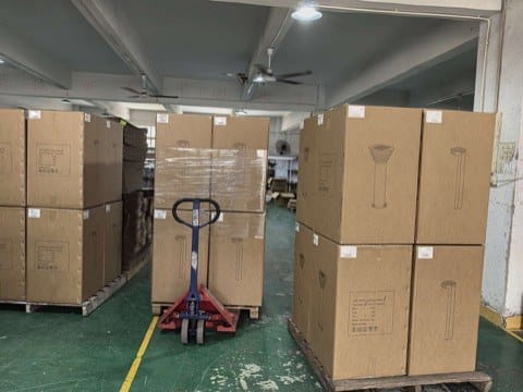 Solar bollard light cartons grouped on pallets at the packing area
